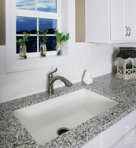 Undermount doublewide sink is scratch resistant, made of composite granite.