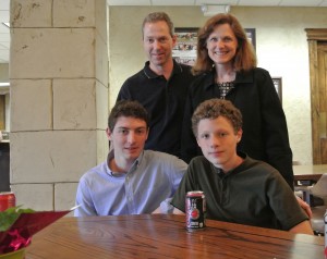 Collin Urquhart, 2013 scholarship recipient, with his family.